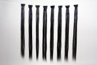 Schwarze Extensions aus Kanekalon