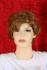 Wig with red curly hair