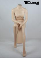 Sitting, female mannequin, skin, headless