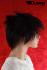 Beautiful, reddish-brown wig with fashionable section