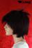 Beautiful, reddish-brown wig with fashionable section