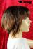 Braune Kurzhaarpercke mit stylischem Pony