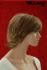 Damenpercke mit mittellangem Haar/hellbraun mit Highlights