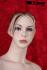 Female window mannequin with hair-do
