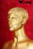 Gold female window mannequin