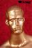 gold painted male window mannequin