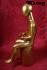 Kinder-Schaufensterpuppe in glnzendem gold, sitzend