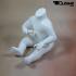 Schaufensterfigur Kind, sitzend