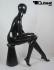 Sitting, female mannequin, black mat faceless