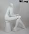 Sitting, female mannequin, white mat, headless