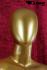 Weibliche Schaufensterpuppe gold faceless