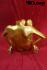 Weibliche Schaufensterpuppe gold sitzend kopflos