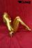 Weibliche Schaufensterpuppe gold sitzend kopflos