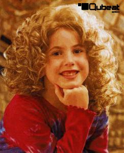 Blonde Kinderpercke mit Locken