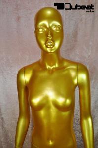 Golden window mannequin