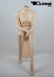 Sitting, female mannequin, skin, headless