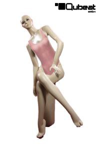Sitting mannequin with head tilted sideways
